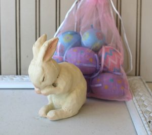 a vintage birdcage makes a beautiful easter or spring centerpiece