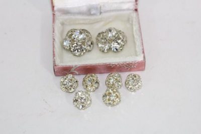 small box of rhinestone buttons